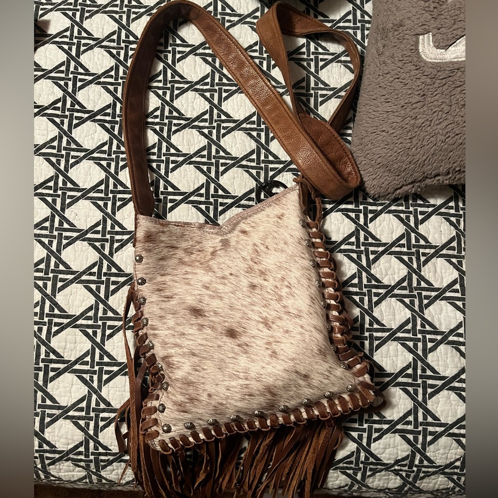Raviani cowhide fringe purse